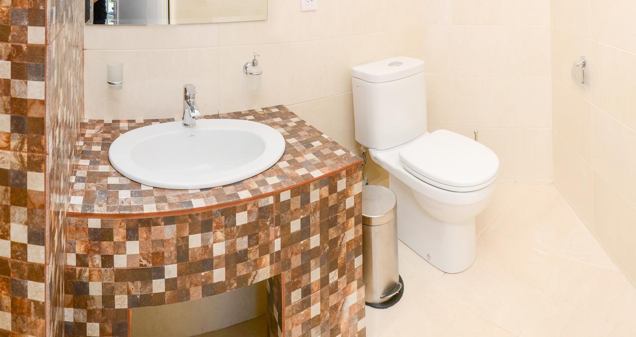 Captain Hotel Затока Екстериор снимка