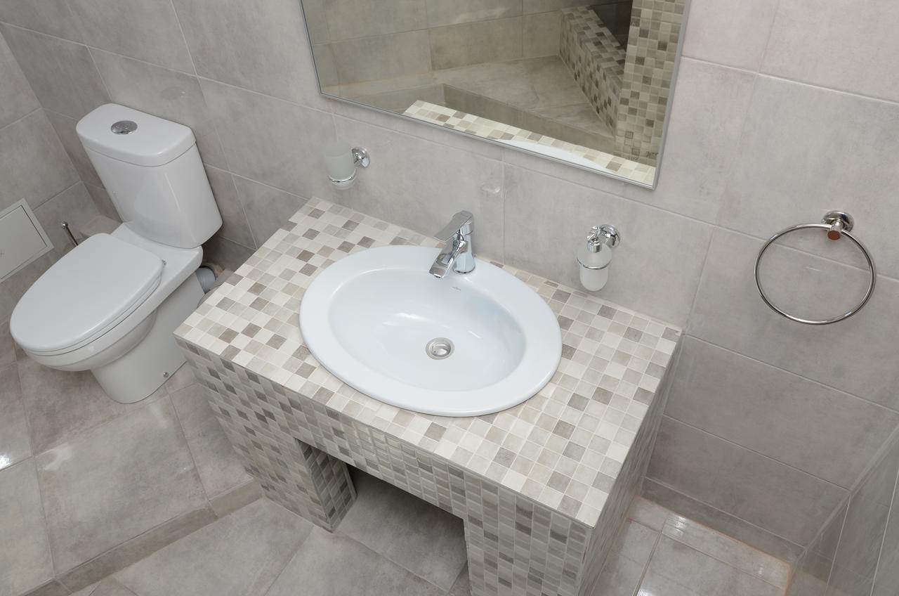Captain Hotel Затока Екстериор снимка