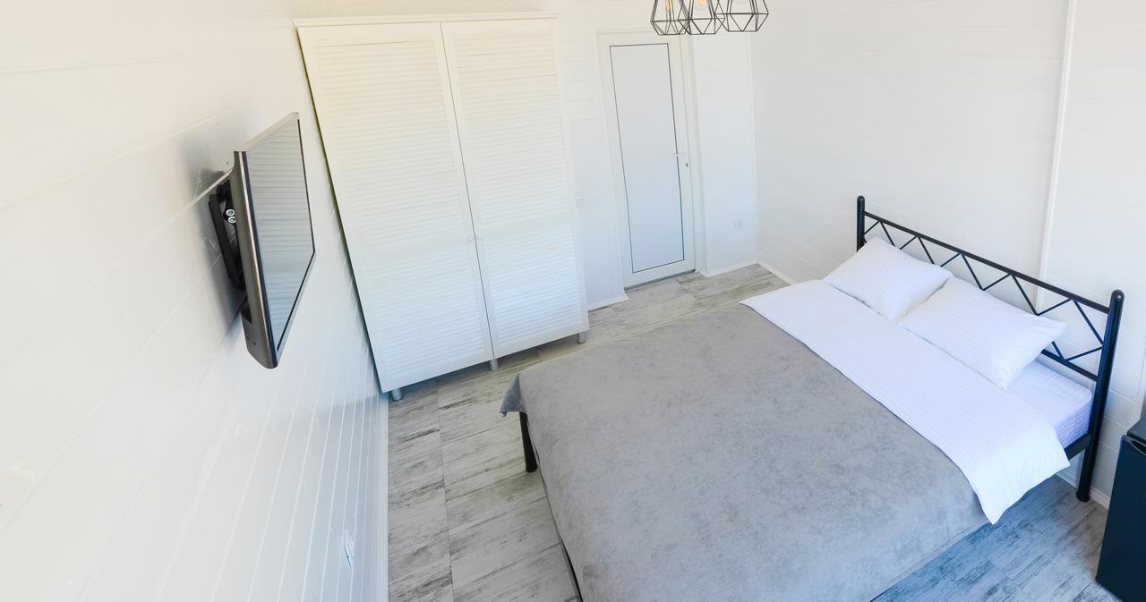 Captain Hotel Затока Екстериор снимка