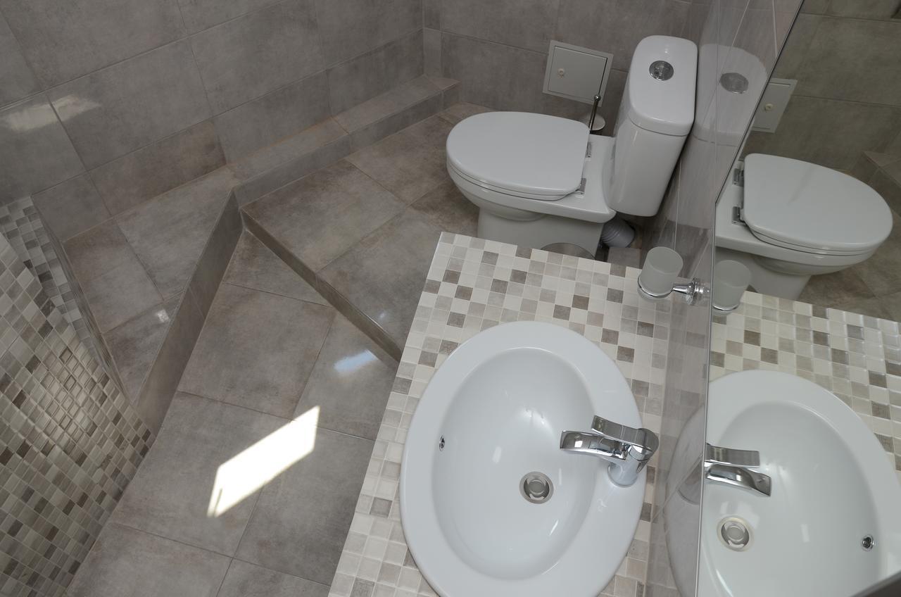 Captain Hotel Затока Екстериор снимка